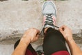 Cropped shot of female in sportswear and sneakers ready for training or running.