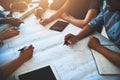 Bringing the best in the business together. Cropped shot of a group of architects working together on a project. Royalty Free Stock Photo