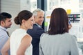 Ill show you what I have in mind. Cropped shot of a group of businesspeople looking at graphs together. Royalty Free Stock Photo