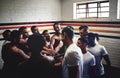 Gathering in the spirit of winning. Cropped shot of a group of handsome young rugby players standing together in a