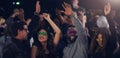 Another year spent together. Cropped shot of a group of young friends dancing together in a nightclub. Royalty Free Stock Photo