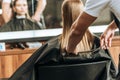 Cropped shot of hairdresser cutting hair to beautiful young woman Royalty Free Stock Photo