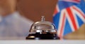 Cropped shot of hotel reception service bell to attract attention Royalty Free Stock Photo