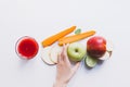 human hand and smoothie with ingredients Royalty Free Stock Photo