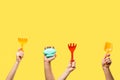 cropped shot of male and female hands holding colorful plastic toys isolated Royalty Free Stock Photo