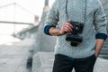 cropped shot of man in stylish sweater with vintage film Royalty Free Stock Photo