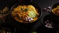Cropped shot of Northern Thai food, Noodles curry soup with Chicken Khao Soi