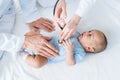 cropped shot of pediatricians listening heartbeat of little baby Royalty Free Stock Photo