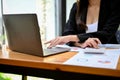 Cropped, Professional Asian businesswoman or female accountant working at her office desk Royalty Free Stock Photo