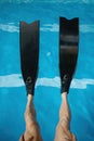 Cropped shot of senior man legs wearing flippers Royalty Free Stock Photo