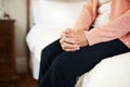 What am I waiting for. Cropped shot of a senior woman sitting on the edge of a bed in a nursing home. Royalty Free Stock Photo