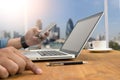 Cropped shot Silhouette of a man's hands using a laptop at home, Royalty Free Stock Photo