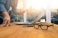 Cropped shot Silhouette of a man's hands using a laptop at home, Royalty Free Stock Photo