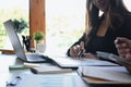 Smiling businesswoman discussing new project with her colleague. Royalty Free Stock Photo