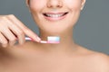 cropped shot of smiling woman holding tooth brush in hand Royalty Free Stock Photo