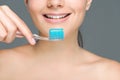 cropped shot of smiling woman holding tooth brush with tooth paste