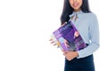 cropped shot of smiling young african american woman holding beauty magazines isolated Royalty Free Stock Photo