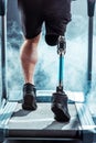 cropped shot of sportsman with leg prosthesis training Royalty Free Stock Photo