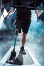 cropped shot of sportsman with leg prosthesis training Royalty Free Stock Photo