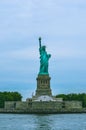 Cropped shot of Statue of Liberty with water and sky. Royalty Free Stock Photo