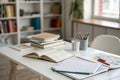 Cropped shot of table with books and stationery Royalty Free Stock Photo