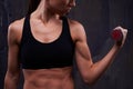 Cropped shot of trained muscular woman showing the relief of abdomen Royalty Free Stock Photo