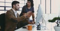 Im stuck on this one section.... Cropped shot of two young designers working together on a computer in their office. Royalty Free Stock Photo