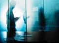 The unseen work is often the most important. Cropped shot of an unrecognizable businessmans silhouette against a glass