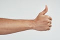 Youve got my vote. Cropped shot of an unrecognizable man showing thumbs up. Royalty Free Stock Photo