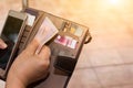 Cropped shot view of female hands picking credit cards from her wallet Royalty Free Stock Photo