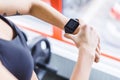 cropped shot of woman checking fitness results Royalty Free Stock Photo