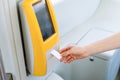 Cropped shot of woman hand inserting ticket into modern validator Royalty Free Stock Photo