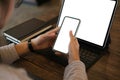 Cropped shot of woman hands using mobile phone and tablet computer with blank copy space screen. Royalty Free Stock Photo