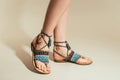 cropped shot of woman legs in stylish sandals Royalty Free Stock Photo