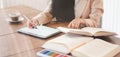 Cropped shot of young beautiful businesswoman working on her project with digital tablet in comfortable office Royalty Free Stock Photo