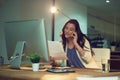 I will email you the updated files. Cropped shot of a young businesswoman working late in an office. Royalty Free Stock Photo