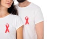 Couple in white t-shirts with aids ribbons