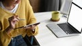 Cropped shot of young graphic designer woman working with digital tablet and stylus pen. Royalty Free Stock Photo