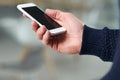 Get ready to be connected. Cropped shot of a young man holding a cellphone. Royalty Free Stock Photo