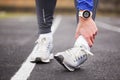 Cropped shot of a young man holding his ankle in pain sprain a f Royalty Free Stock Photo