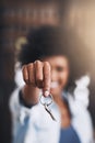 The keys to freedom. Cropped shot of a young woman holding house keys in her new home. Royalty Free Stock Photo