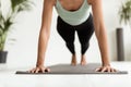 Cropped Shot Of Young Woman Making Push Ups On Fitness Mat Indoors Royalty Free Stock Photo