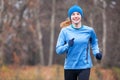 Cropped shot of a young woman running. Royalty Free Stock Photo