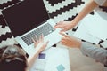 cropped shot of young women working on laptop Royalty Free Stock Photo