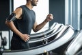 Cropped Of Smiling Black Man In Sportswear Jogging On Treadmill At Gym Royalty Free Stock Photo