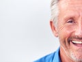 Cropped Studio Shot Of Mature Man Against White Background Laughing At Camera