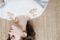 Cropped upside image of beautiful young woman in summer dress lying on the floor Royalty Free Stock Photo