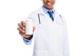cropped view of african american male doctor in white coat with pill bottle, Royalty Free Stock Photo