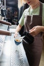 Cropped view of barista in apron Royalty Free Stock Photo