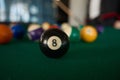 Cropped view on billiard balls on pool table Royalty Free Stock Photo